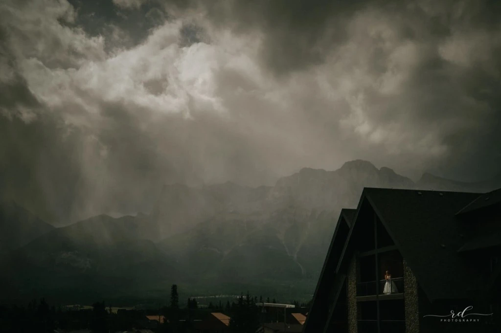 Dramatic mountain landscape with an A-frame lodge — photography by Rick Dang